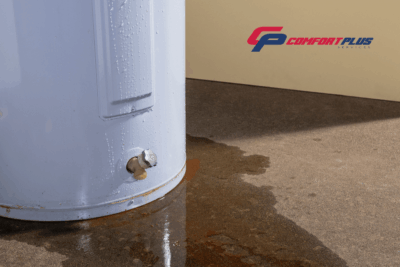 Leaking traditional water heater.