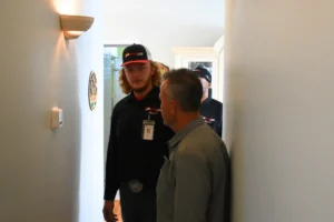 An HVAC technician assesses an entire HVAC system to make sure it's sized correctly for the home.