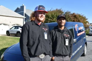 CPS NATE-Certified HVAC and Mini-Split Technicians Comfort Plus Services technicians with an HVAC service vehicle in Seaford, DE.