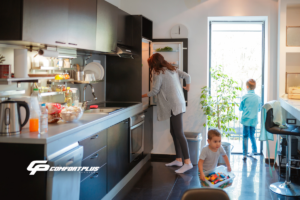 Summer Indoor Air Quality Issues A mother and two children spend a summer day inside their Eastern Shore home, in the kitchen. Featured image for the summer indoor air quality blog post.