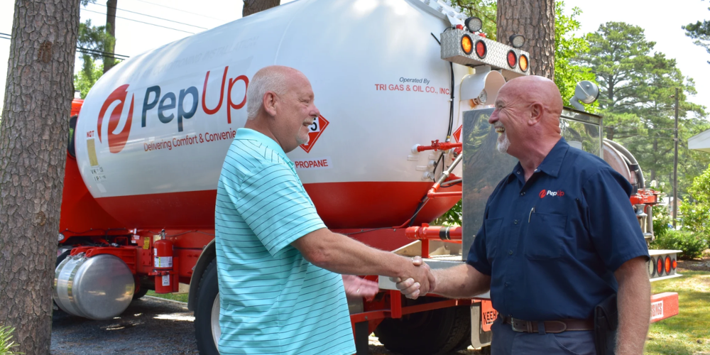 image of pepup customer propane delivery driver handshake